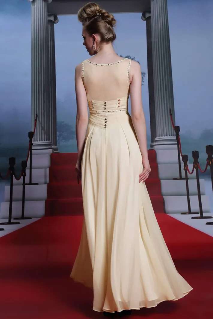 ---Light yellow ceremony dress made in chiffon with draped bodice and many decorations of sparkling stones--