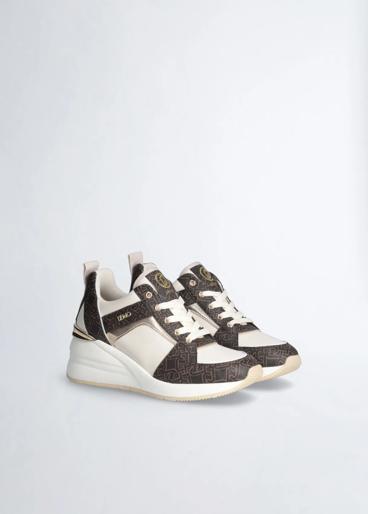 Sneakers monogram con zeppa