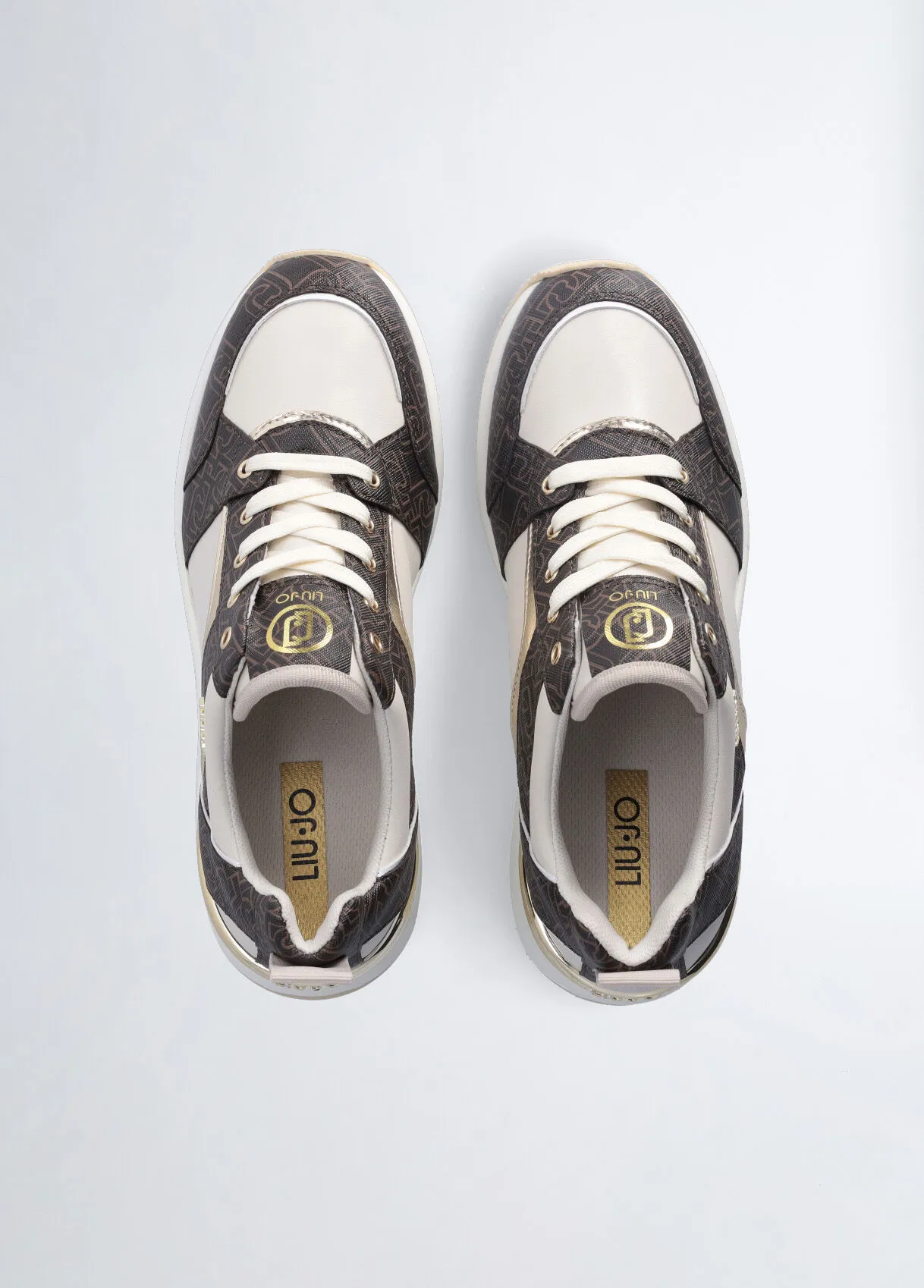 Sneakers monogram con zeppa