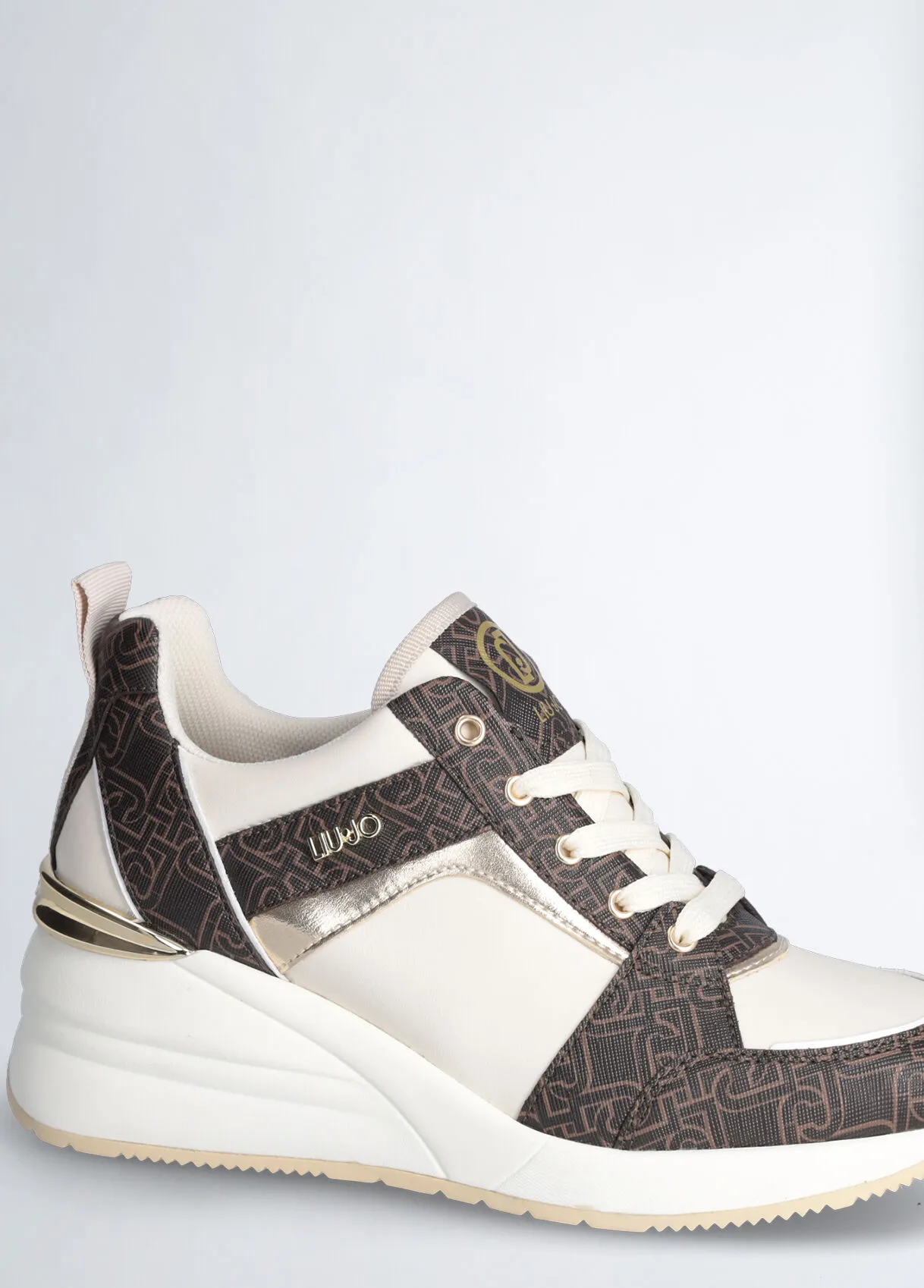 Sneakers monogram con zeppa